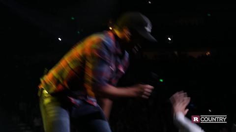 Watch Luke Bryan hit a guy in the front row for flipping him off | Rare Country