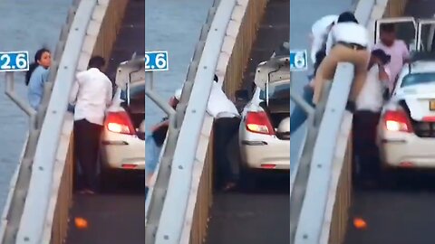 Woman Attempts Suicide by Jumping Off Bridge, Rescued by Cab Driver and Traffic Police