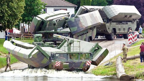Amphibious Rig Driving into River _ Ferry Operation