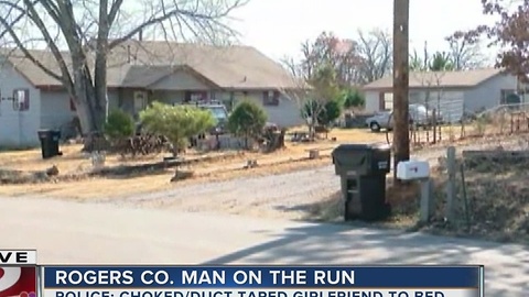 Man on run after after choking his girlfriend