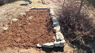 Building a Stone Retaining Wall For a Flower Bed