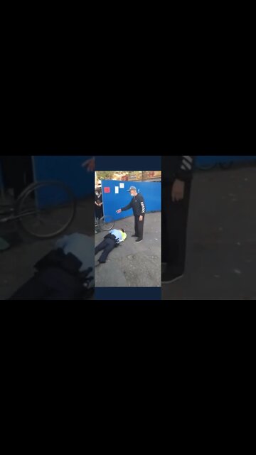 CCP Police Officer Pretends to Fall after Man Complains