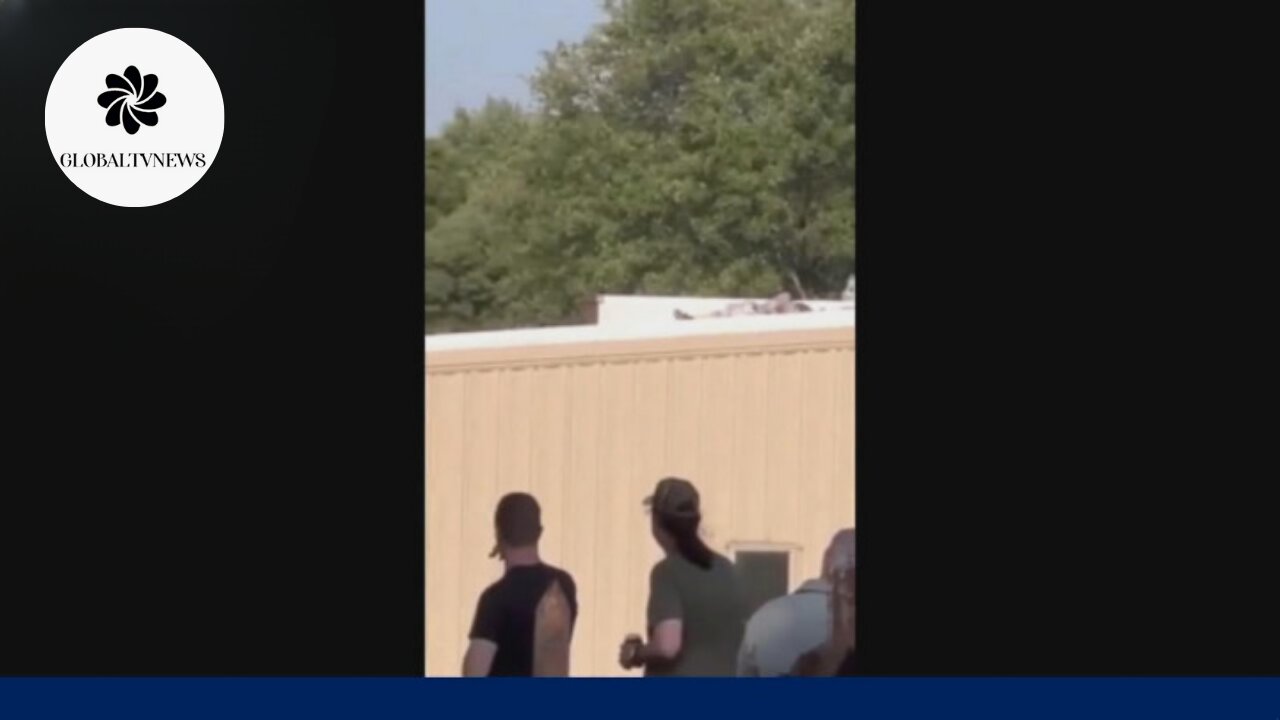 Image from Trump rally shows gunman shot on roof of nearby building
