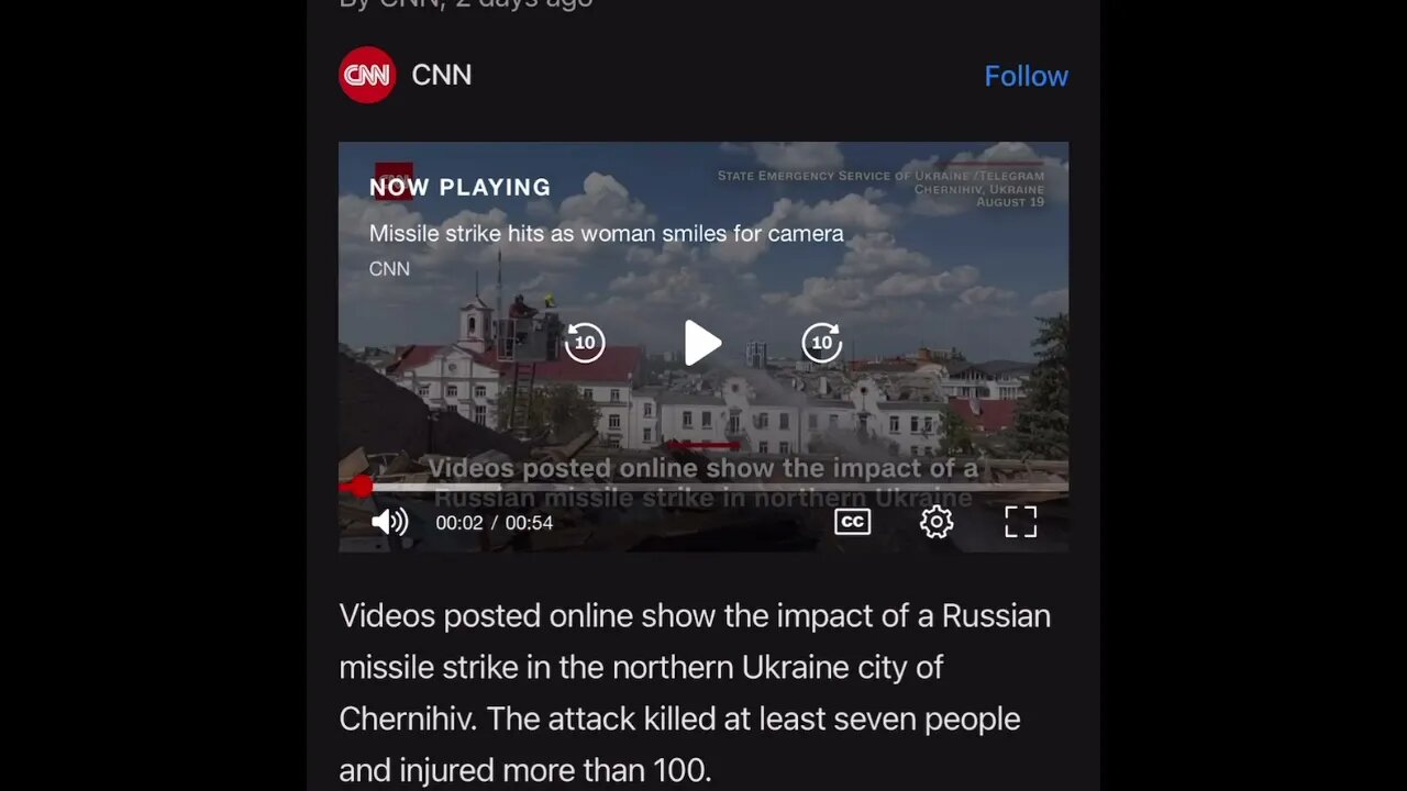 Missile attack hits as woman smiles for camera