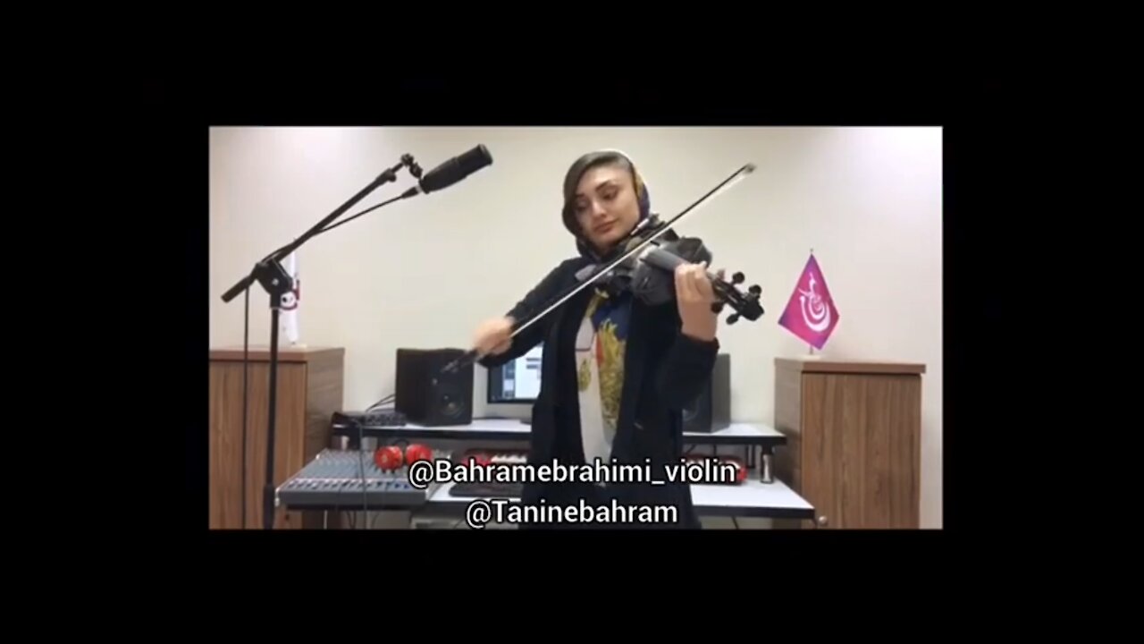 Playing the violin by the daughter of the Iranian artist