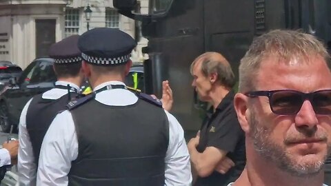 police question truck driver towing Biden cars away #horseguardsparade