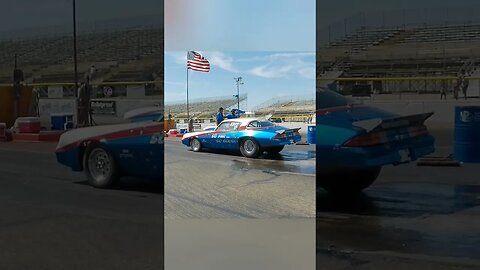 Camaro in Red White & Blue and Willys coupe prepare to rumble