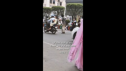 a begger helping ladies