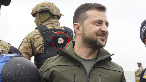 Zelensky posing in Izyum with his guard wearing SS Nazi insignia