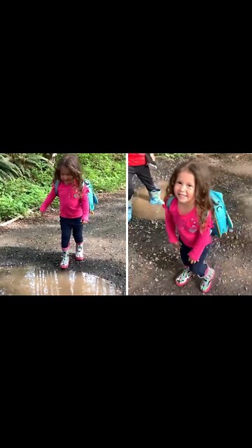 Little Girl Tries To Jump Over Puddle, Adorably Fails