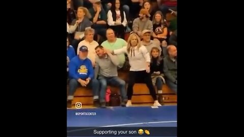 Mom really gets into supporting her sons wrestling!