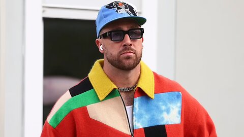 "Travis Kelce's Colorful Jacket Stuns Fans"