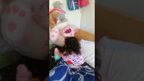 Curly sweet baby girls talks to her dolls-peppa pig and daddy pig