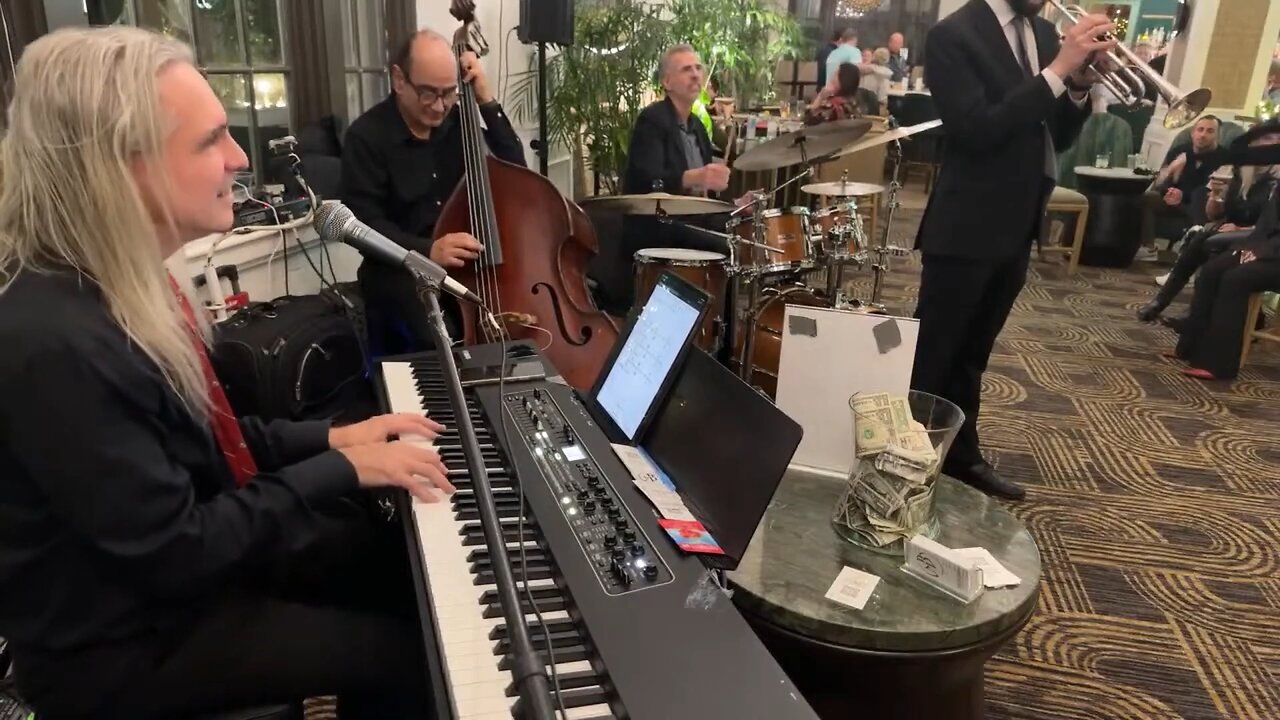 A pretty amazing trumpet guy wanders by...finishes our "last song" but we have to do this....