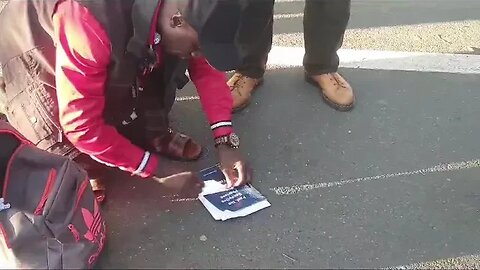 Bro Lamin & Abdullaah at speakers corner. The Cross on the floor !