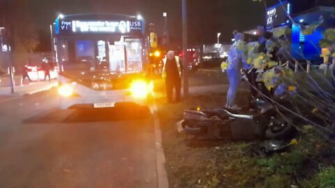 BIKER HELPED OUT OF THE ROAD