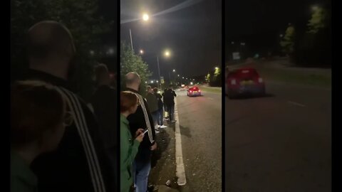 RACER NEARLY CRASHES