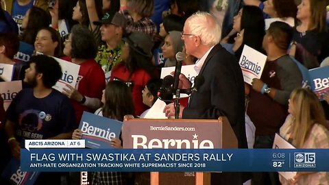 Arizona man described as white supremacist drapes Nazi flag at Sanders rally