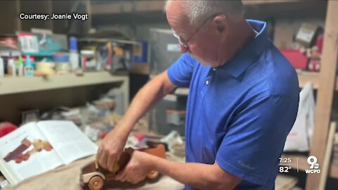 Cancer survivor inspires others by crafting wooden trucks that 'dump' the disease