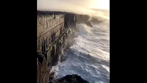 Waves against the cliffs of Inis Meain, Ireland.