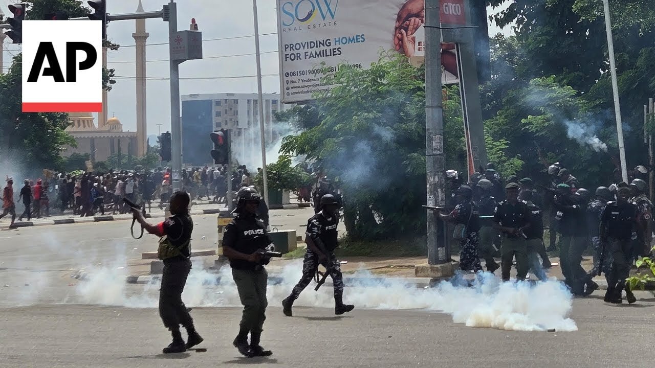Police fire gunshots, tear gas as thousands protest the crisis in Nigeria | NE