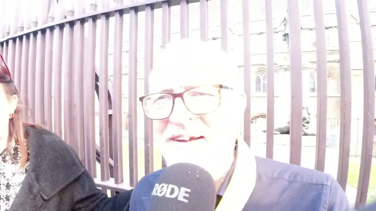 Free Assange human chain surround parliament