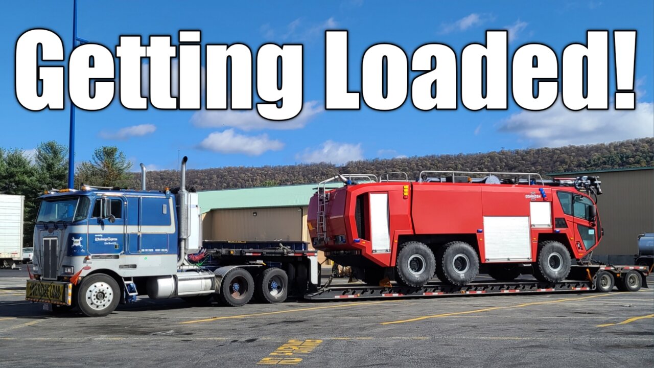 Orwell The Cabover Loading An Oshkosh Striker To Baltimore - 062