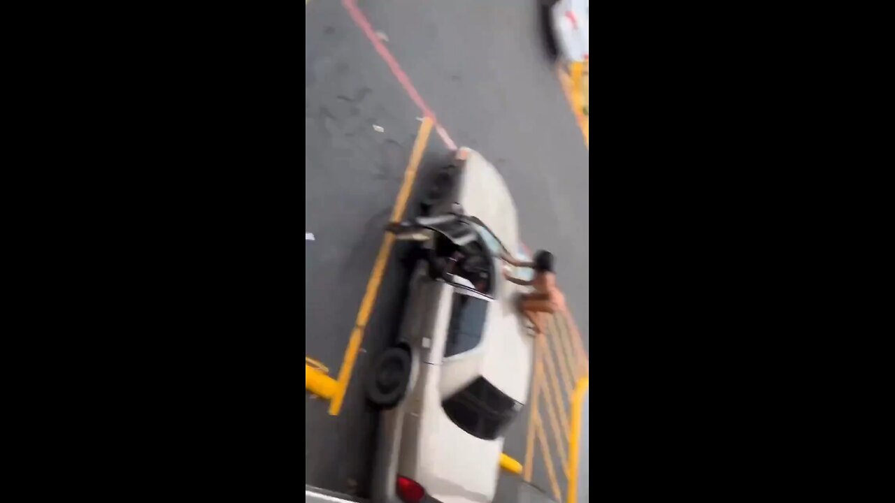 Woman Destroys Boyfriend’s Car with Him In It