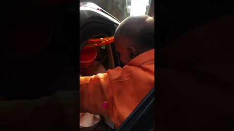Indian PM Narendra Modi accept a pagdi and scarf from a man on the streets of Varanasi