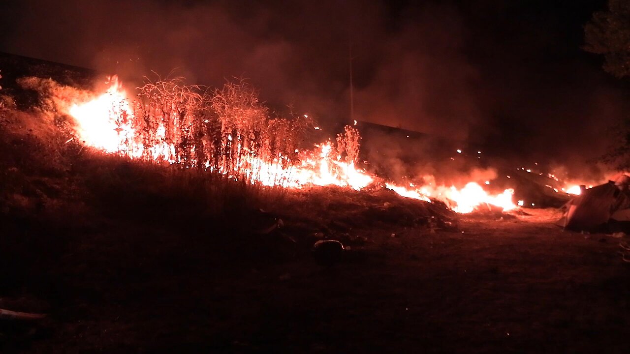 Homless connected wildfire burns in California