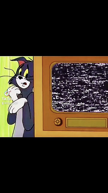 Tom watching Beyond the Badge, Inside the Bars