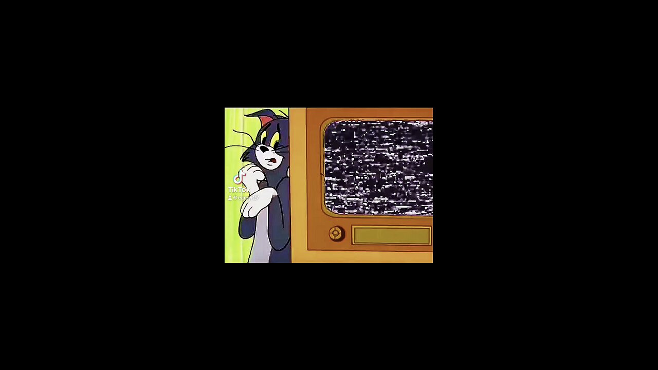 Tom watching Beyond the Badge, Inside the Bars