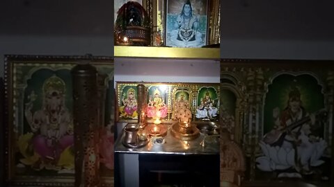 Hindu praying at home.