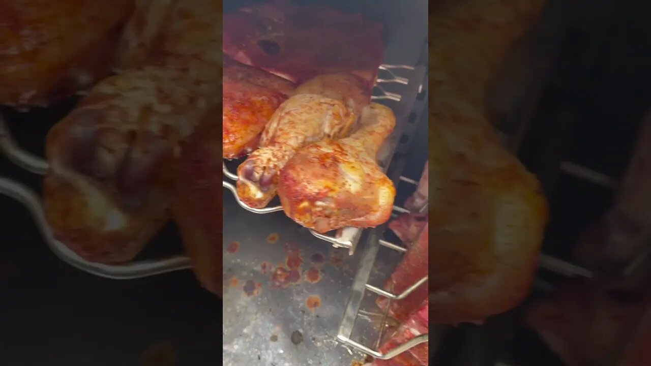 Smoking chicken and ribs.