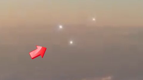 Witnessed three light UFOs taken from an aircraft window [Space]