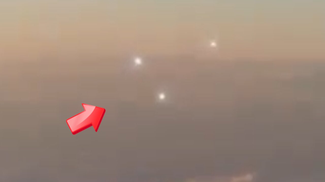 Witnessed three light UFOs taken from an aircraft window [Space]