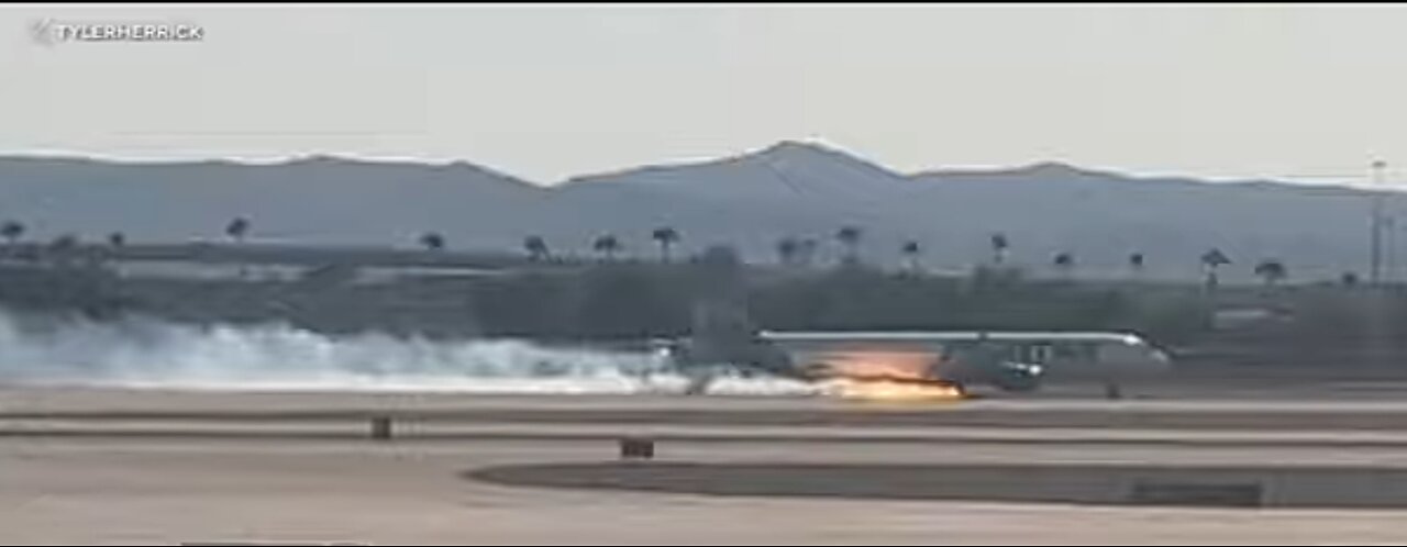 Flames seen under Frontier Airlines flight as it makes hard landing in Las Vegas