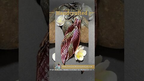 PONDERING GLORY, 4 inch, feather inspired leather keyring