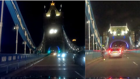 Driving through the Tower Bridge London at night