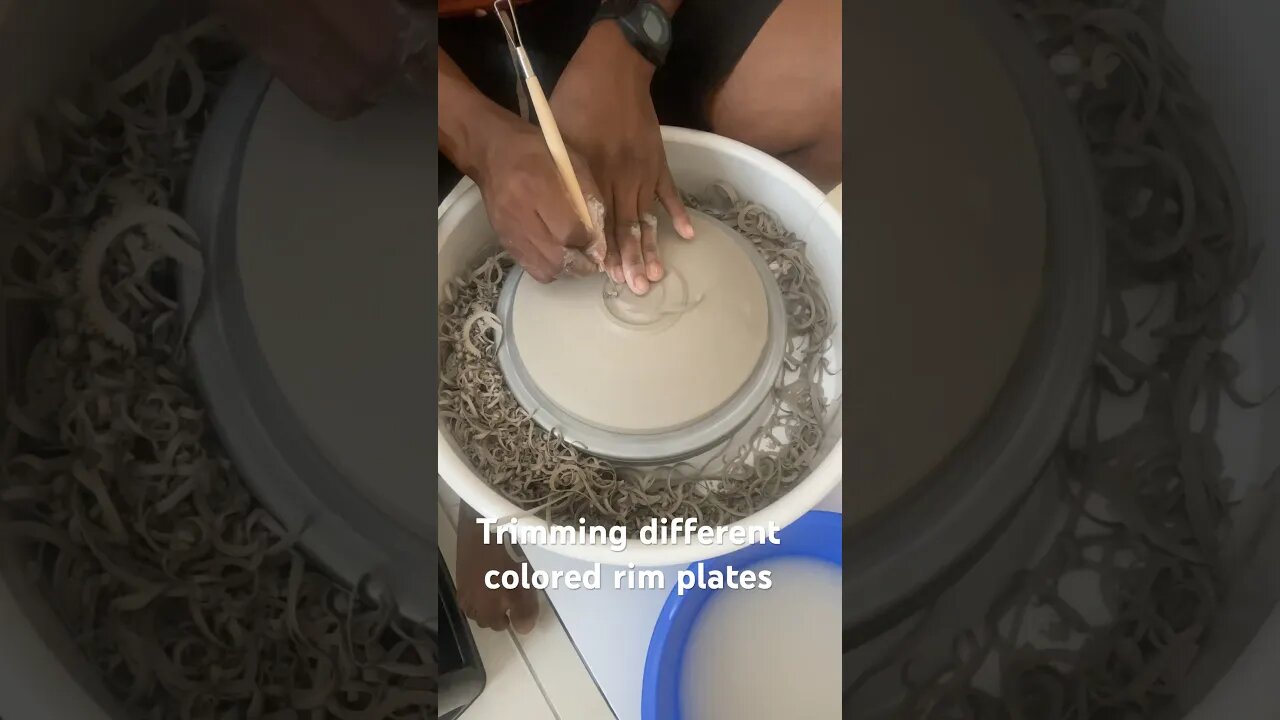 Trimming different colored rim plates. #studiopottery #ceramic #pottery #wheelthrowing