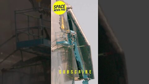 Spacex Starship technician working on starship wing