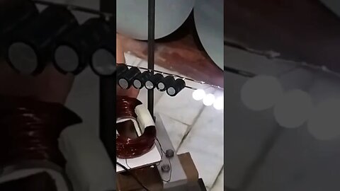 reciprocating magnet-coil-generator lights up LED Bank #shorts