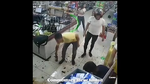 Robber gets caught and beaten by employees.