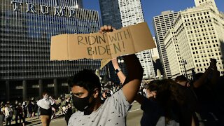 Americans Take To The Streets In Celebration, Protest After Biden Win