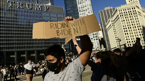 Americans Take To The Streets In Celebration, Protest After Biden Win