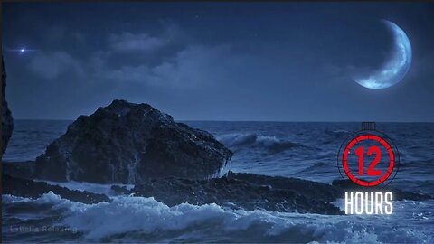Waves Crashing Onto A Rock Under The Moonlight