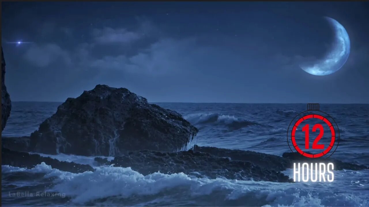 Waves Crashing Onto A Rock Under The Moonlight