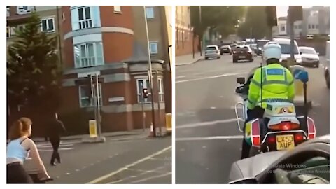 girl goes through trafic Not knowing cop is behind and get caught