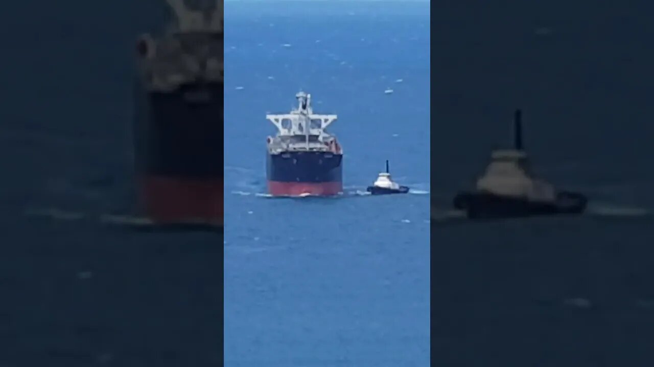 Tugboat At Work With A Woodchip Carrier. #trending #shorts #merchantnavy #lifeatsea #tuglife #ocean