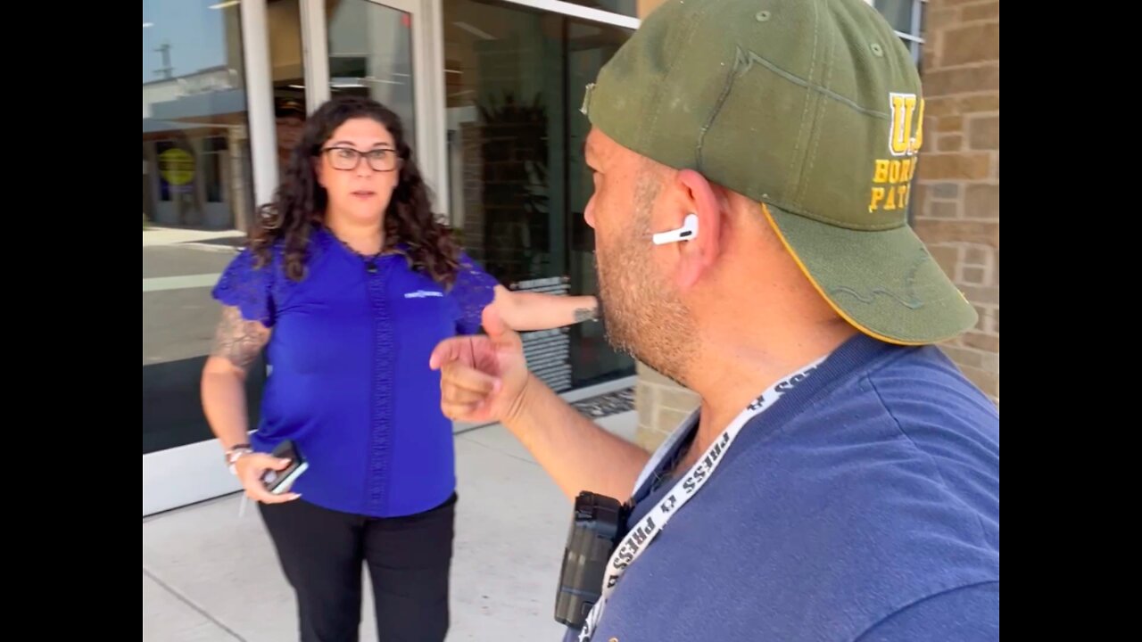 A woman charges at me to try to silence me. That will never happen
